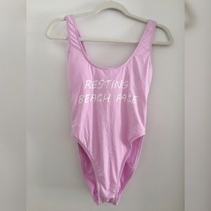 Resting Beach Face one piece swim suit